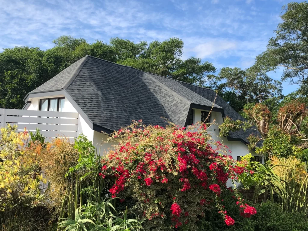 Converting thatch roof to shingle tiles in Chintsa, Eastern Cape